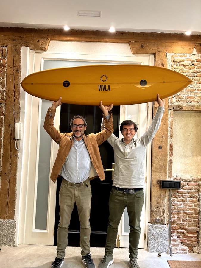 A surfboard moment with the VIVLA team